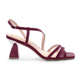 A women's heeled sandal in deep burgundy with a low block heel, square toe, and thin crossover straps.